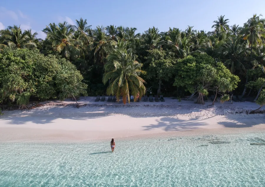 Aerial view of Maldives atoll lagoons and reef rings