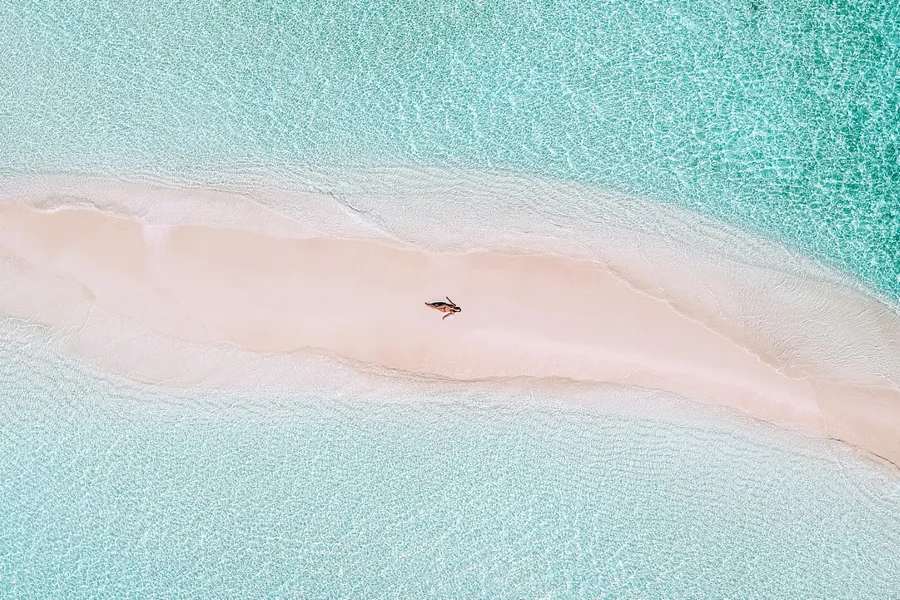 Maldives sandbank and lagoon at sunset