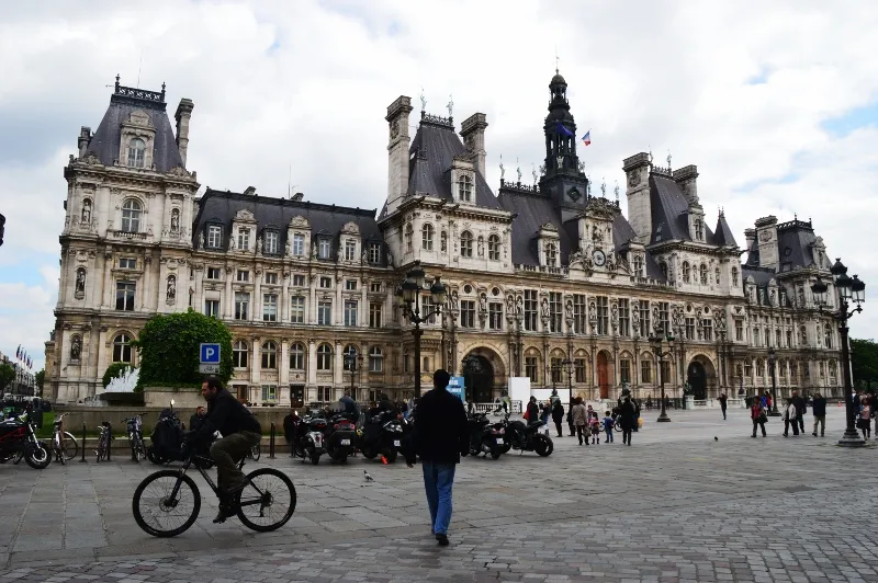 Moody Paris street scene with classic buildings and soft grey light