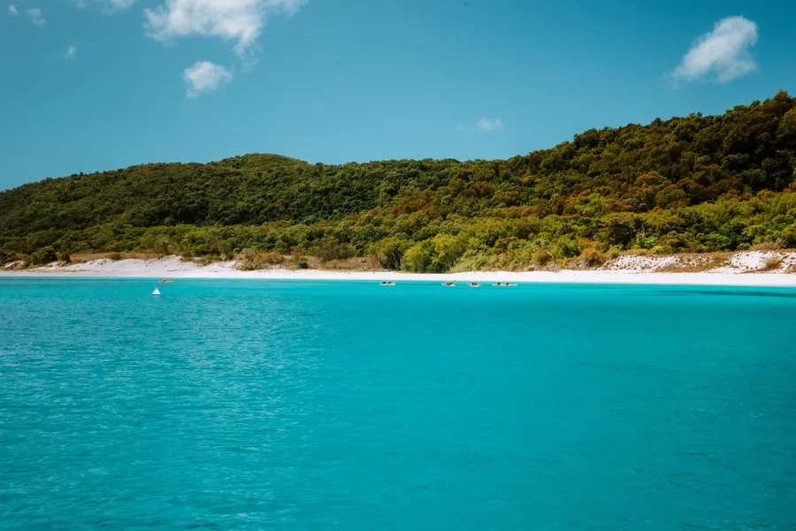 Whitehaven Beach with brilliant white sand and turquoise water