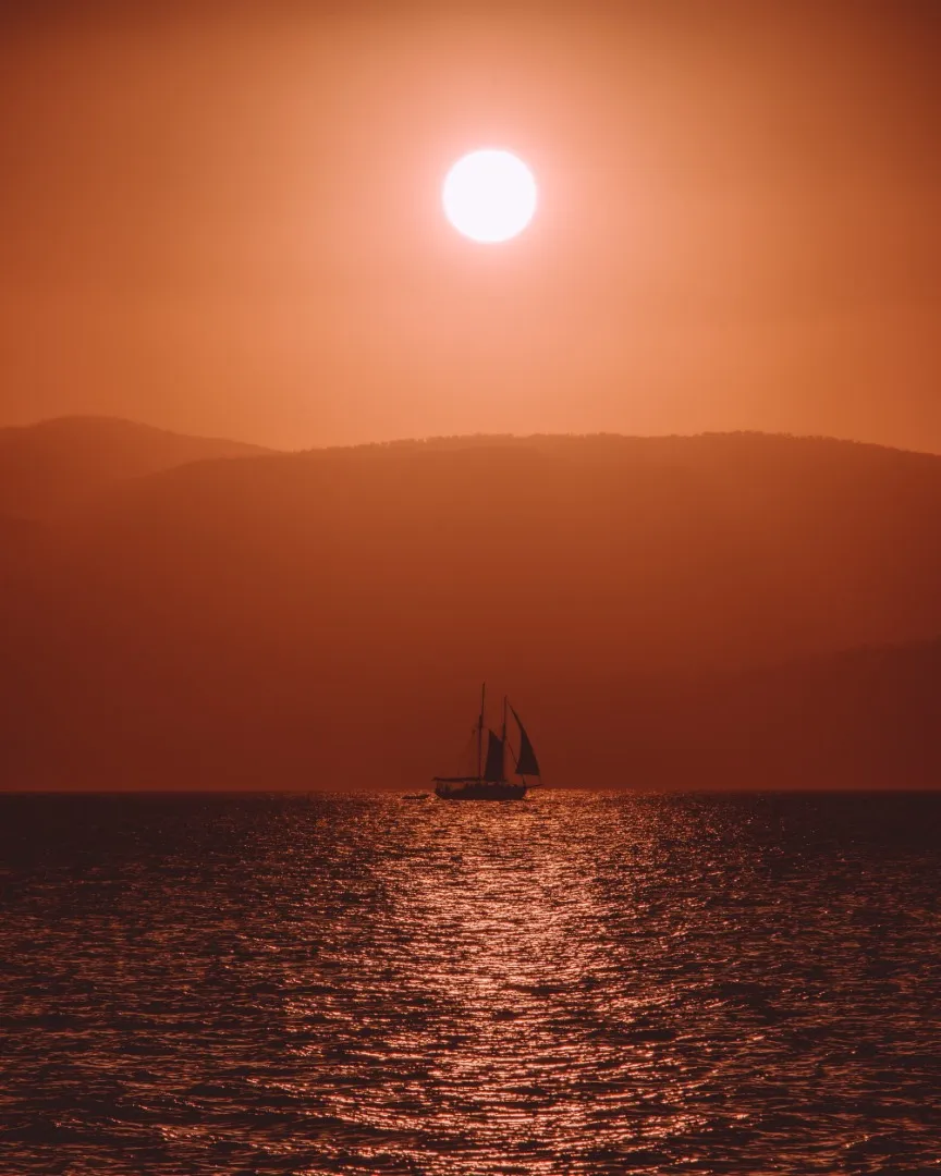Sunset from our sailboat at anchor in the Whitsundays